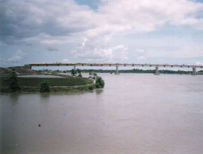 A completed multi-span bridge spanning a wide river